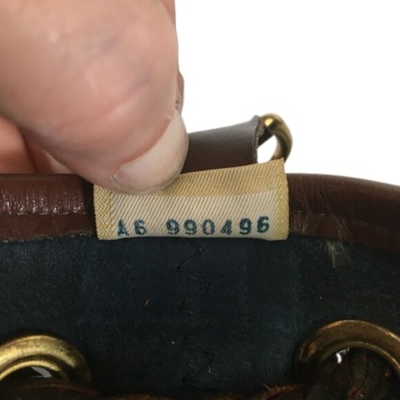Dooney Bourke AWL Pebbled Leather Drawstring Hobo Bucket Navy Brown Shoulder Bag - Picture 12 of 16